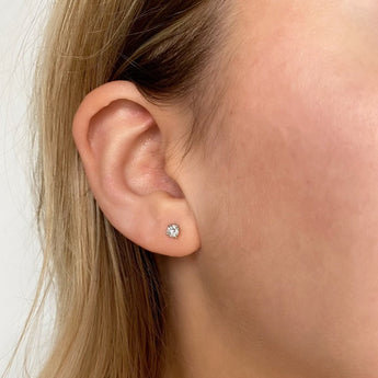 diamond studs on a person