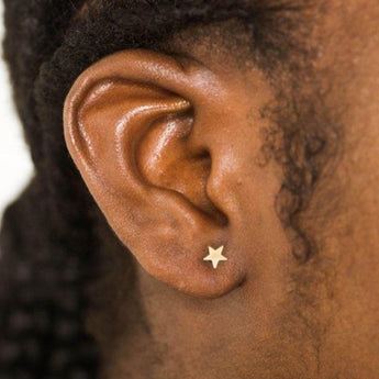 solid gold star studs