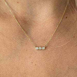 three diamond bezel necklace