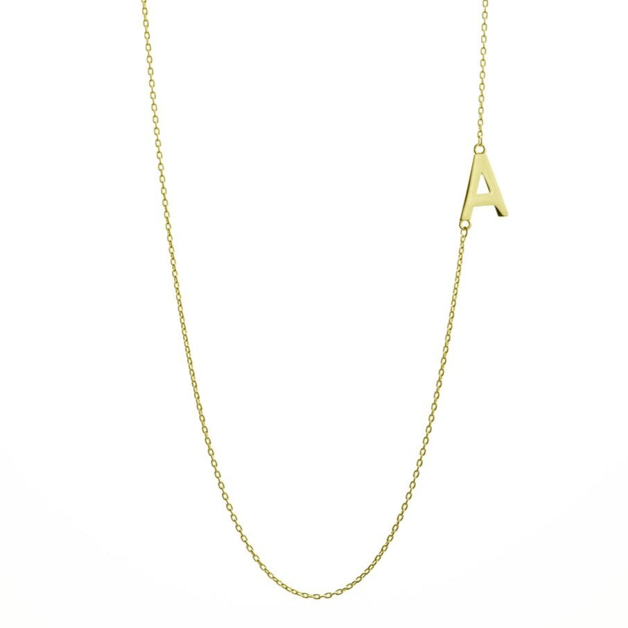initial necklace in yellow gold