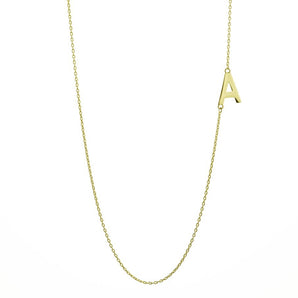 initial necklace in yellow gold