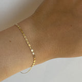 gold valentino bracelet