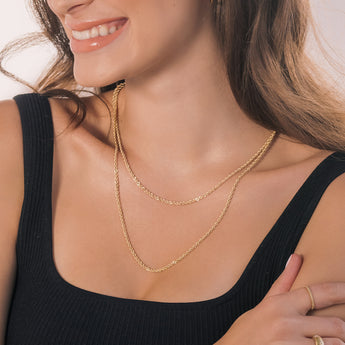two yellow gold rope chains