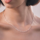 sterling silver thin paperclip chain on a person